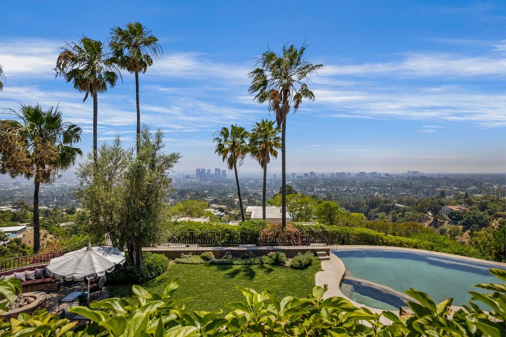 1499 Blueridge Drive Home in Beverly Hills, California. Discover "Villa Theos," the most iconic view compound in Los Angeles, spanning over 2 acres and featuring multiple structures totaling over 28,000 sqft.