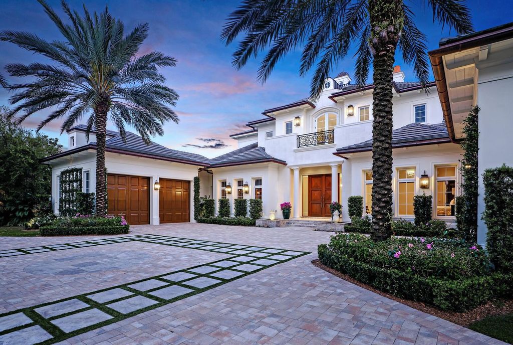 Welcome to 131 W Bears Club Drive, an exclusive retreat in Jupiter's prestigious golf community. This custom-built estate, one of only 48 in the enclave, offers over 12,000 square feet of luxury living on nearly 0.6 acres.