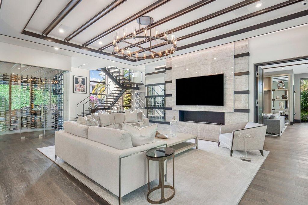 1857 Sabal Palm Circle Home in Boca Raton, Florida. Step into unparalleled luxury with this custom Signature Estate by SRD smart home in East Boca Raton. Built in 2019, this stunning residence features exquisite finishes, open floor plan, and smart home technology. 