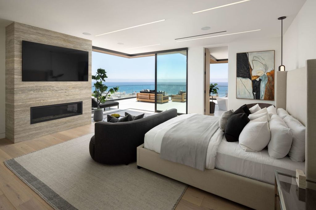 23917 Malibu Road Home in Malibu, California. Experience luxury coastal living in this contemporary masterpiece by architect Doug Burdge, located in the private and gated Malibu Colony Estates.