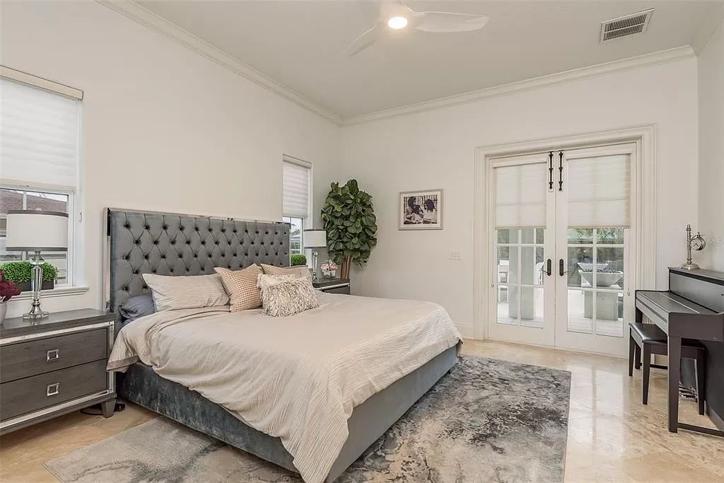 Experience unparalleled luxury waterfront living in this meticulously renovated custom-built Dolphin Home on 100 feet of saltwater frontage in Stoney Point, South Tampa.