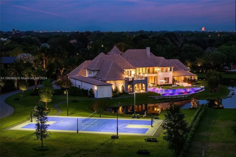 Magnificent French Country Mansion with Basketball Court, and Serene Lake Views, Southwest Ranches for $19 Million