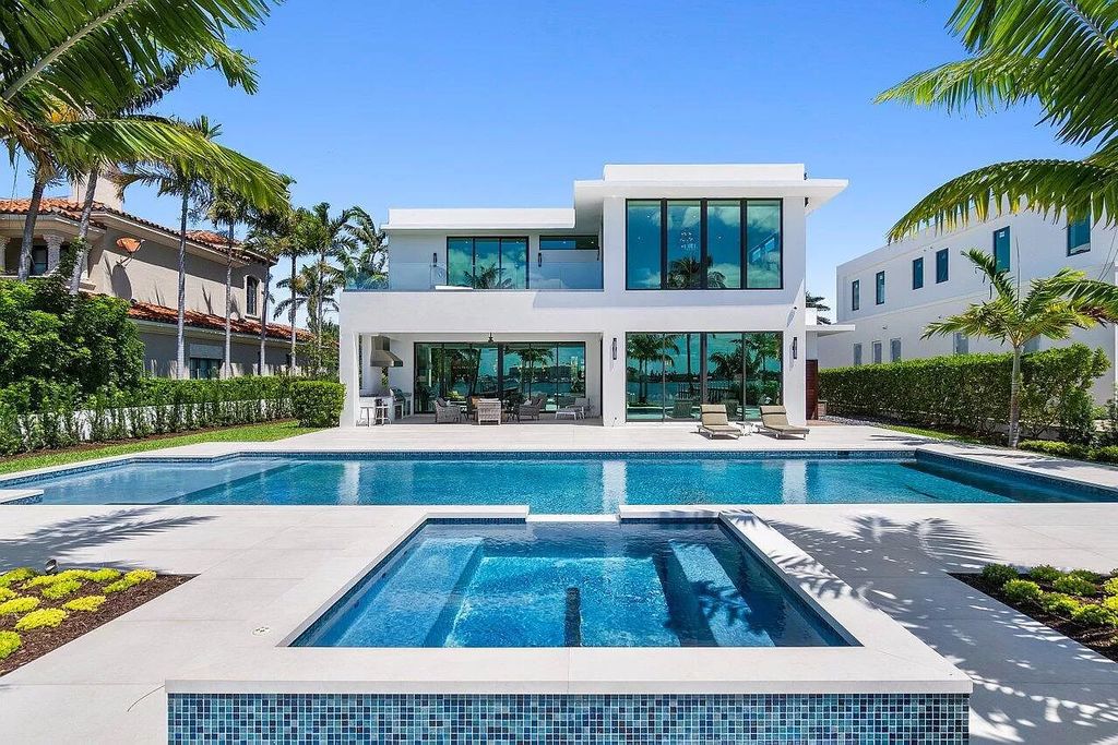 Nestled on prestigious Hypoluxo Island, 807 N Atlantic Dr is a captivating ultra-modern waterfront estate offering 5 bedrooms, 6.5 bathrooms, and over 5,000 square feet of luxurious living space.