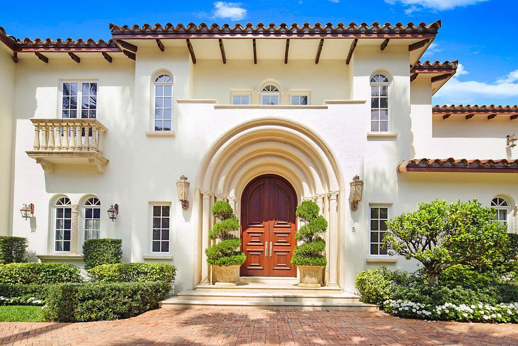 Nestled on over an acre of lush land in the heart of Palm Beach, Florida, 5 Via Sunny presents a rare opportunity to own a Mediterranean villa estate exuding charm and privacy, yet just a stroll away from the Royal Poinciana Plaza and local restaurants.