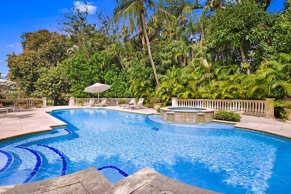 Nestled on over an acre of lush land in the heart of Palm Beach, Florida, 5 Via Sunny presents a rare opportunity to own a Mediterranean villa estate exuding charm and privacy, yet just a stroll away from the Royal Poinciana Plaza and local restaurants.