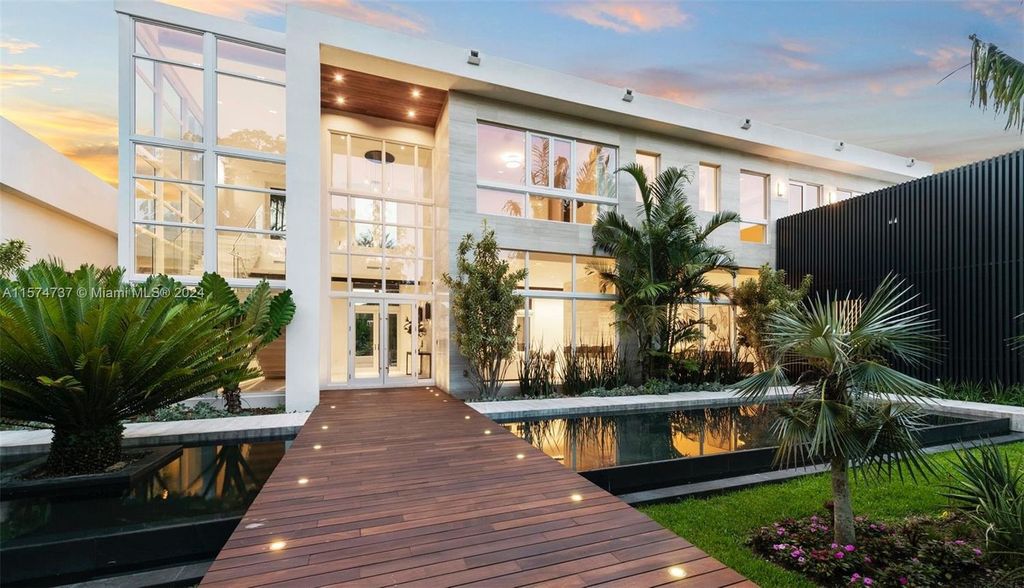 Step into this ultra-exquisite modern oasis in Pinecrest, FL, embodying luxury living at its finest. Seamlessly blending indoor and outdoor spaces, this 2021-built residence offers over 12,000 square feet of meticulously crafted living space.