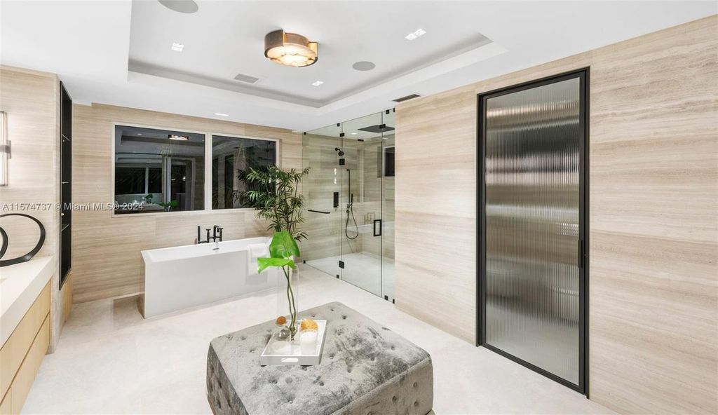 Step into this ultra-exquisite modern oasis in Pinecrest, FL, embodying luxury living at its finest. Seamlessly blending indoor and outdoor spaces, this 2021-built residence offers over 12,000 square feet of meticulously crafted living space.