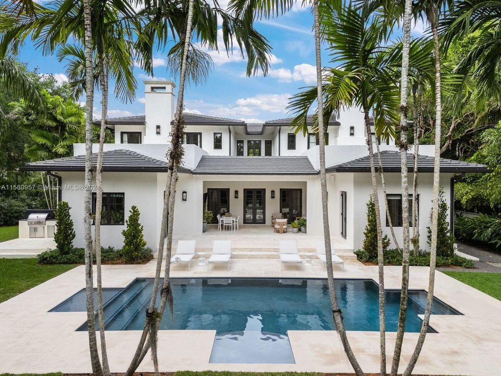 Nestled within the prestigious Stonegate guard-gated community in Ponce-Davis, this magnificent estate offers six bedrooms, six full bathrooms, two half-bathrooms, and 7,164 square feet of exquisitely renovated space.