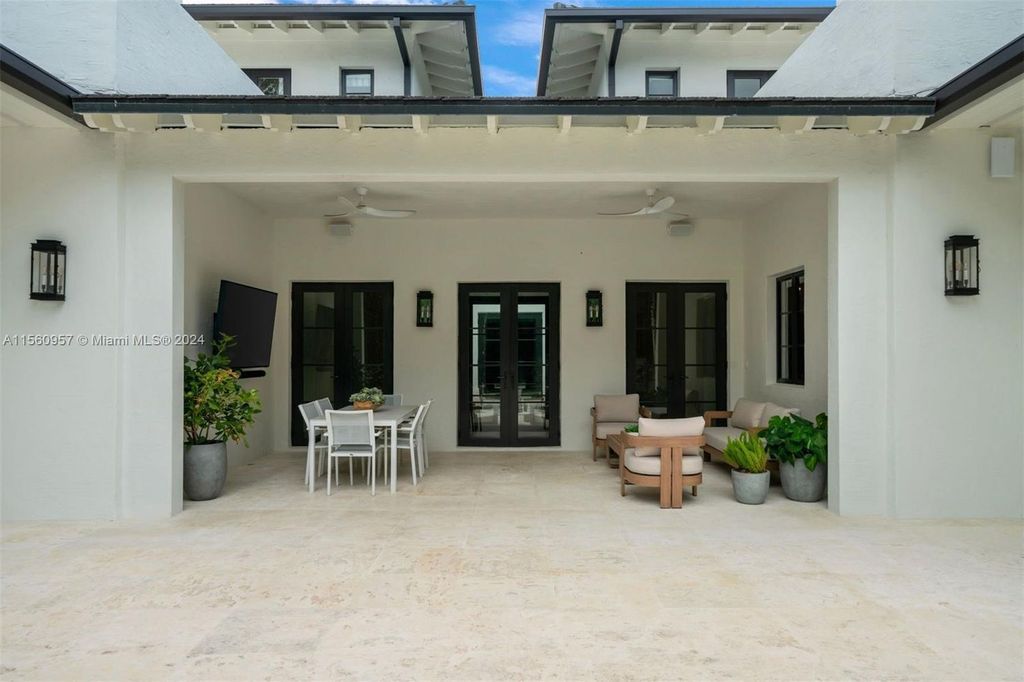 Nestled within the prestigious Stonegate guard-gated community in Ponce-Davis, this magnificent estate offers six bedrooms, six full bathrooms, two half-bathrooms, and 7,164 square feet of exquisitely renovated space.
