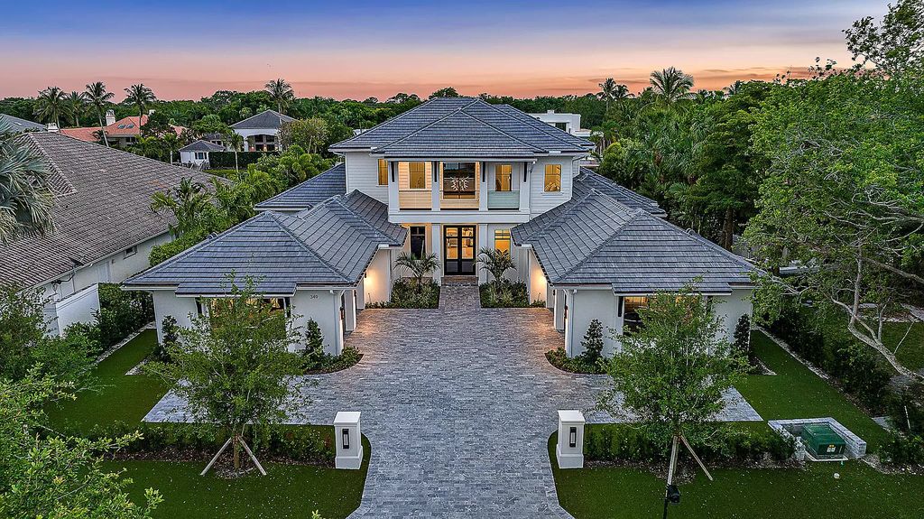 Step into luxury living at 349 Eagle Dr, Jupiter, FL 33477! This newly completed waterfront estate by Hasey Builders boasts 5 en-suite bedrooms, including a lavish primary suite with opulent finishes and stunning water views.