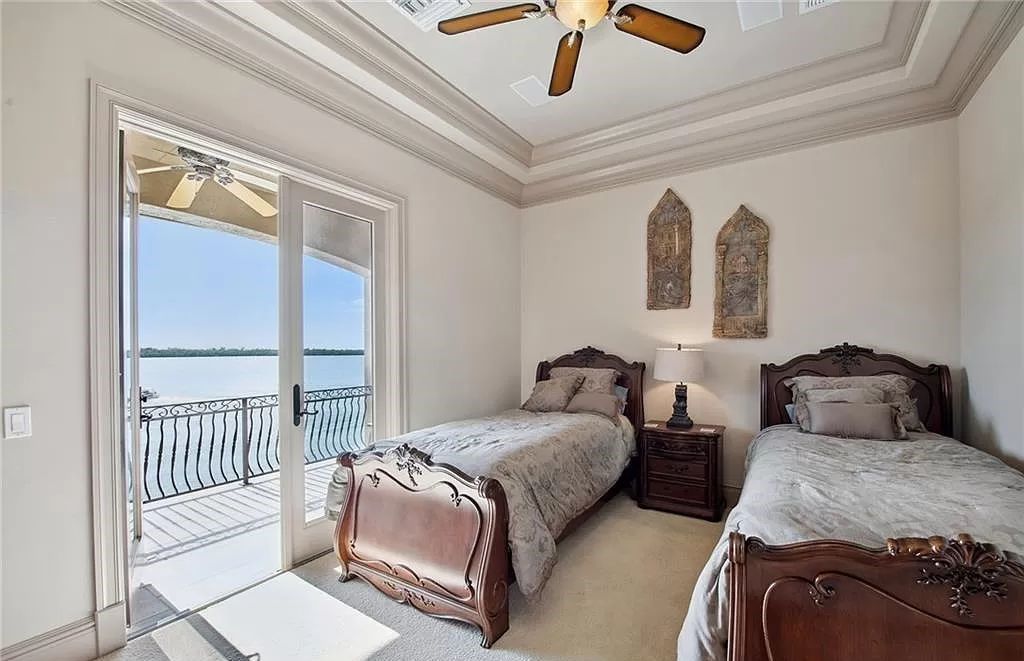 Experience the epitome of Marco Island luxury living in this spectacular 3-story custom-built home boasting 5,591 square feet of unsurpassed quality and craftsmanship.