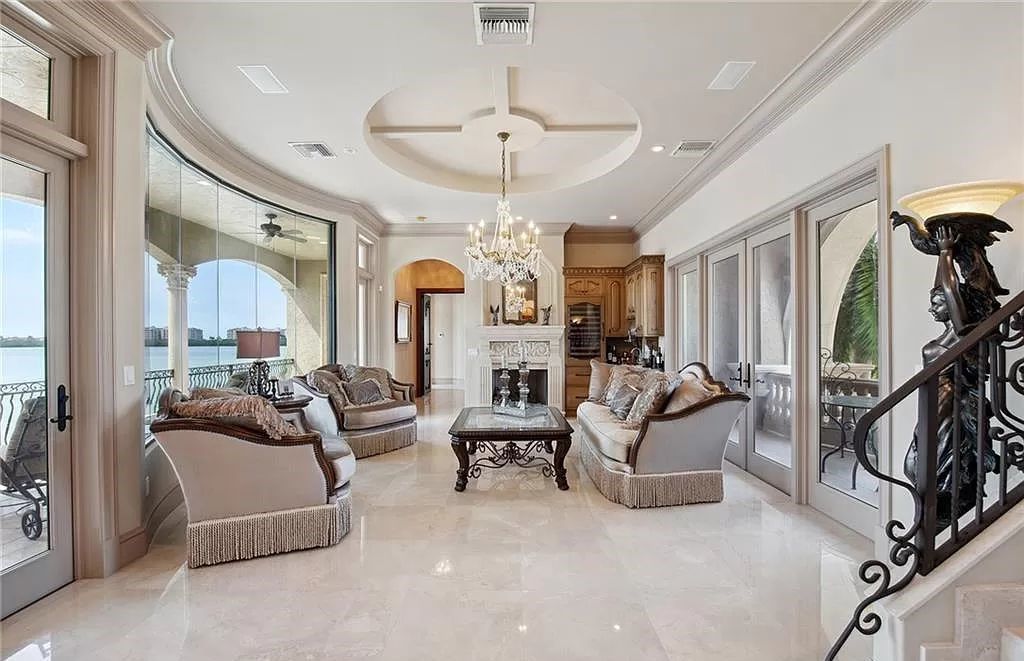 Experience the epitome of Marco Island luxury living in this spectacular 3-story custom-built home boasting 5,591 square feet of unsurpassed quality and craftsmanship.