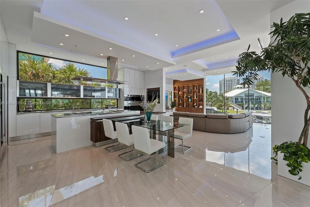 Welcome to 1133 Belle Meade Island Dr, a breathtaking Bay/Canal Contemporary Residence in the heart of Miami. This New Construction marvel boasts 100+ ft on deep water, showcasing Travertine exterior walls and ultra-luxury finishes throughout its 12,200 SF under A/C.