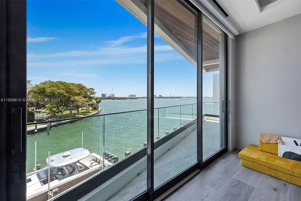Welcome to 1133 Belle Meade Island Dr, a breathtaking Bay/Canal Contemporary Residence in the heart of Miami. This New Construction marvel boasts 100+ ft on deep water, showcasing Travertine exterior walls and ultra-luxury finishes throughout its 12,200 SF under A/C.