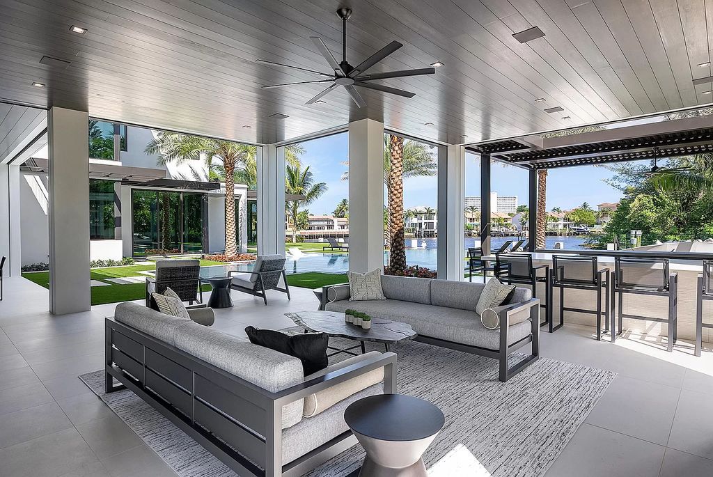 Welcome to 372 E Alexander Palm Rd, a stunning Intracoastal Signature Estate in Boca Raton's Royal Palm Yacht & Country Club crafted by SRD Building Corp.