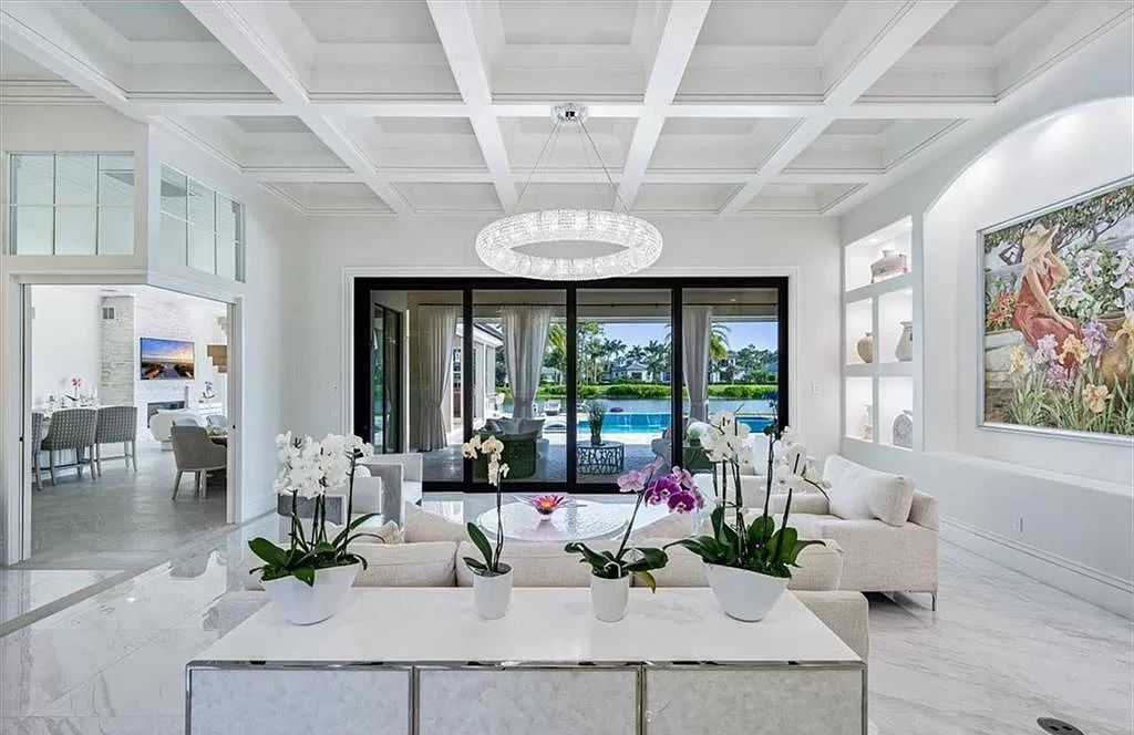 Welcome to 6536 Highcroft Drive in Quail West, Naples, Florida - a home where luxury meets comfort in every detail.
