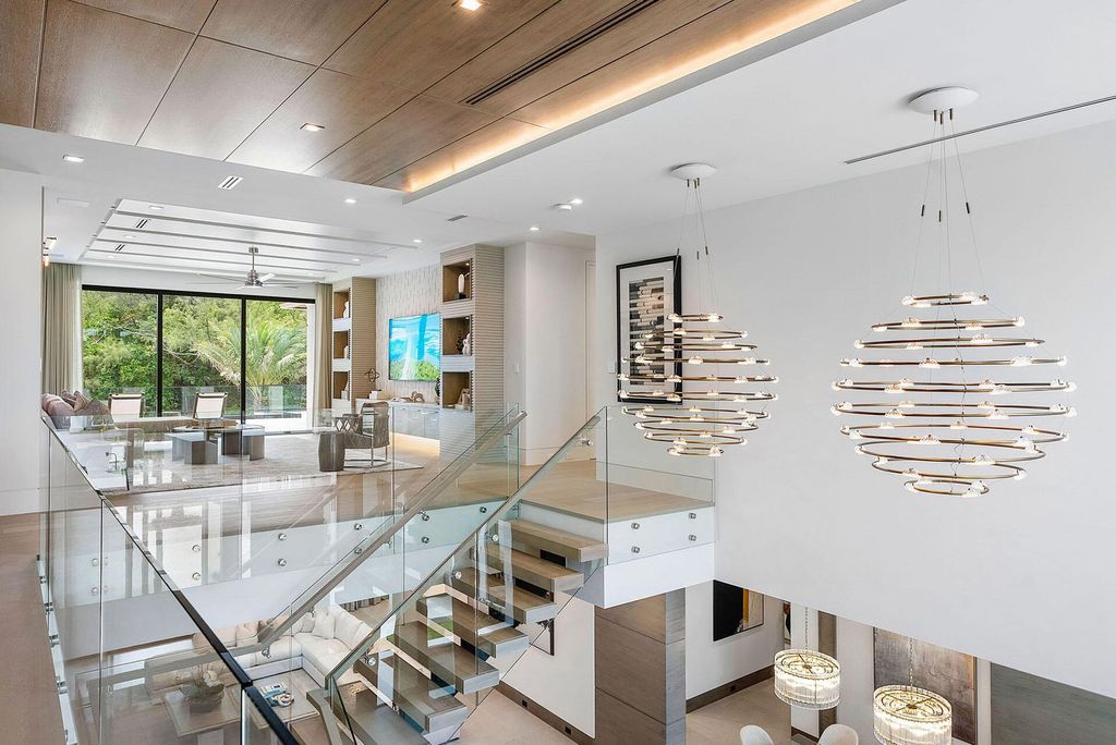 Experience unparalleled luxury at 360 E Alexander Palm Road, a stunning masterpiece by SRD Building Corp in Boca Raton. 