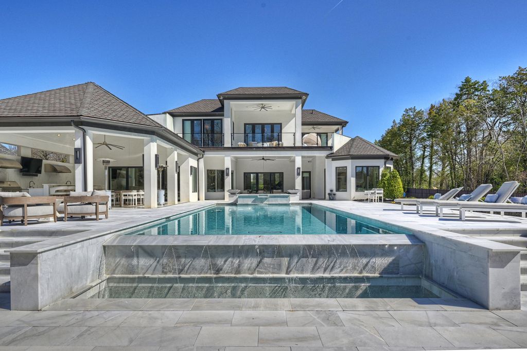 3612 English Garden Drive Home in Charlotte, North Carolina. Discover the epitome of modern luxury living in this sleek and spacious 2020-built home set on a sprawling 1.7-acre fenced and gated estate.