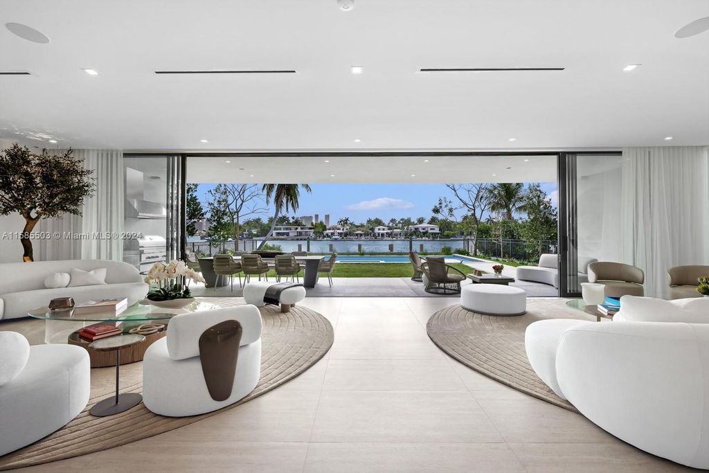 Welcome to 310 West Dilido, an unparalleled waterfront residence on Miami Beach's Venetian Islands. This modern marvel boasts captivating Downtown Skyline views and a West-facing orientation, promising stunning sunsets daily.