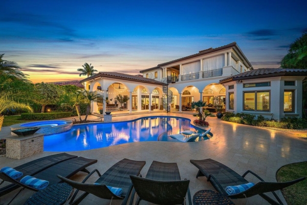 Discover Exquisite Tranquility in this $9 Million Waterfront Estate, Nestled within Prestigious Sanctuary Bay of Jupiter