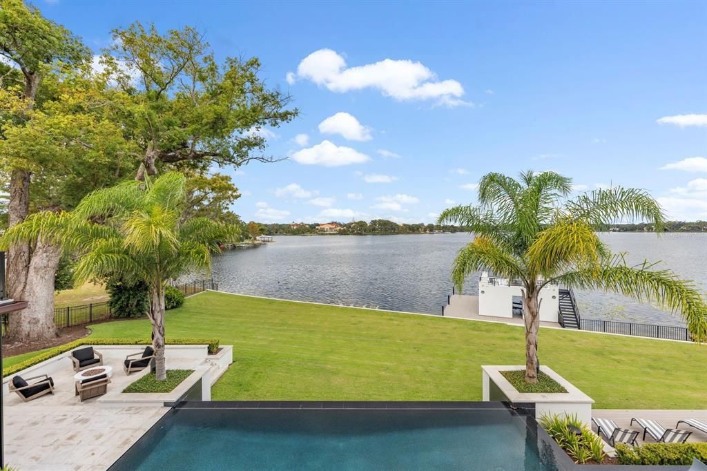 With professional landscaping, a renovated boathouse, and a dock with Trex decking, this property epitomizes waterfront living at 181 Virginia Dr, Winter Park, FL 32789.
