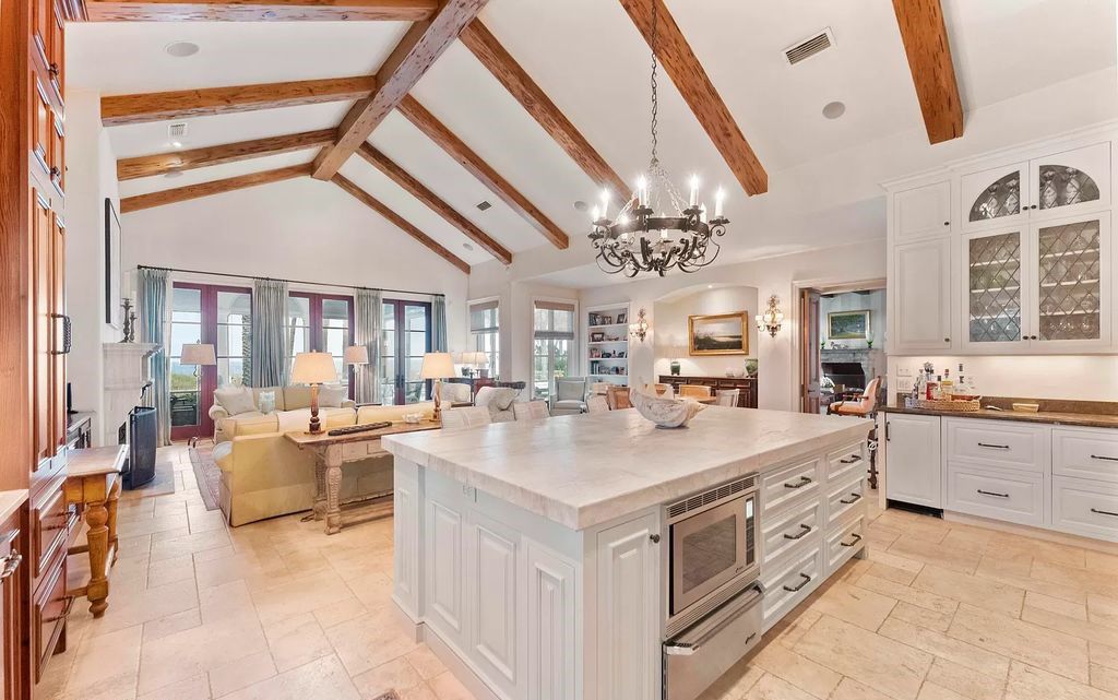 Discover a rare oceanfront gem in Old Ponte Vedra Beach at 75 Ponte Vedra Boulevard. This exquisite 4-bed, 6-bath home, built in 2006, spans 6,557 square feet on a 0.75-acre lot.