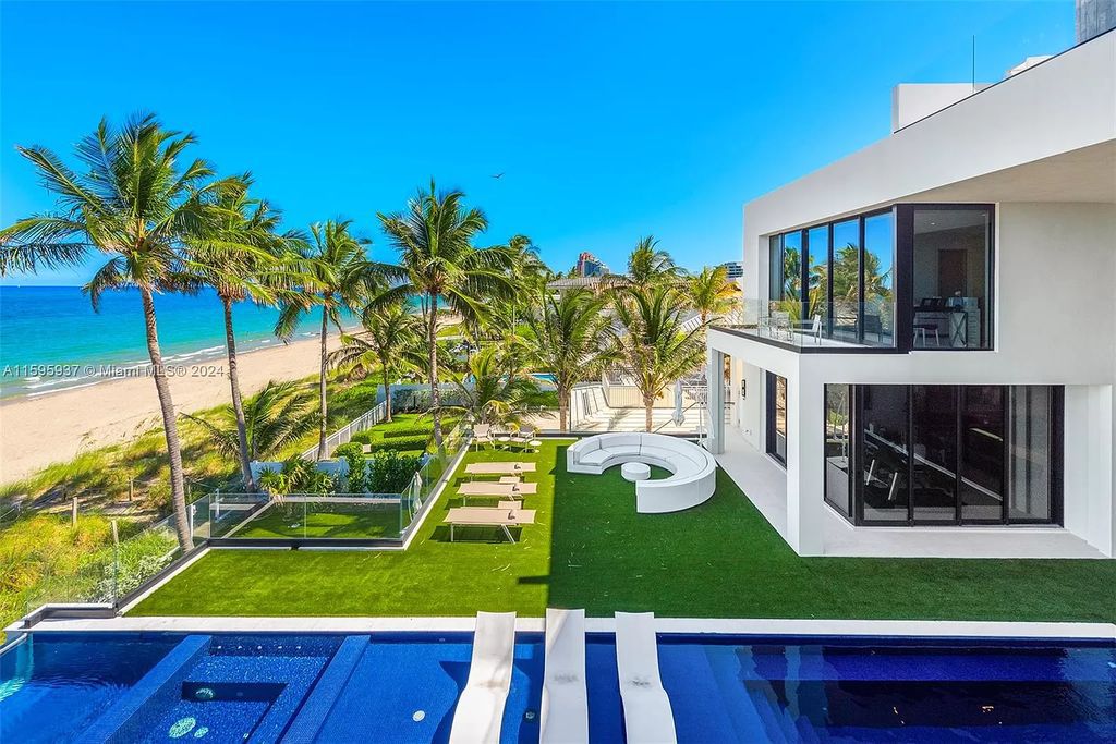 This stunning 7-bedroom, 4-bath estate spans 10,289 sq. ft. on a 0.36-acre lot, with 100 feet of pristine ocean frontage.