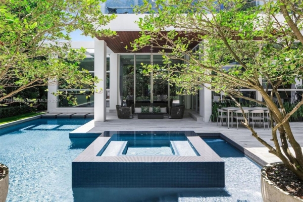 View of Exquisite Modern Luxury Home with Pool and Outdoor Kitchen in Golden ...