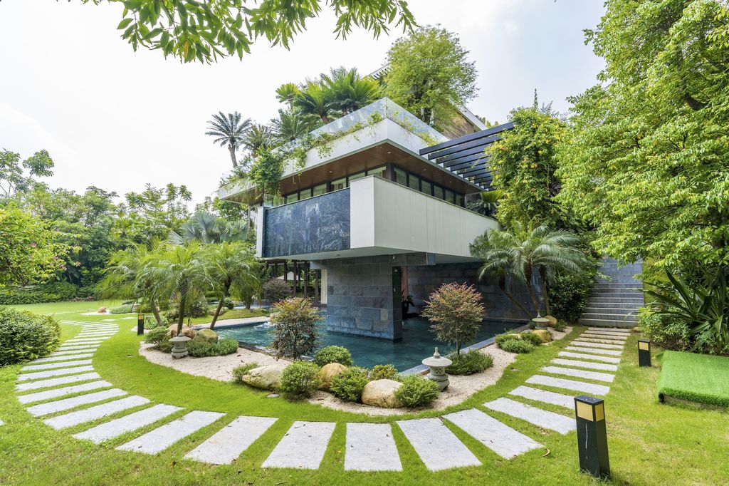 Legend Mansion Villa in Vietnam by Flamingo Architecture