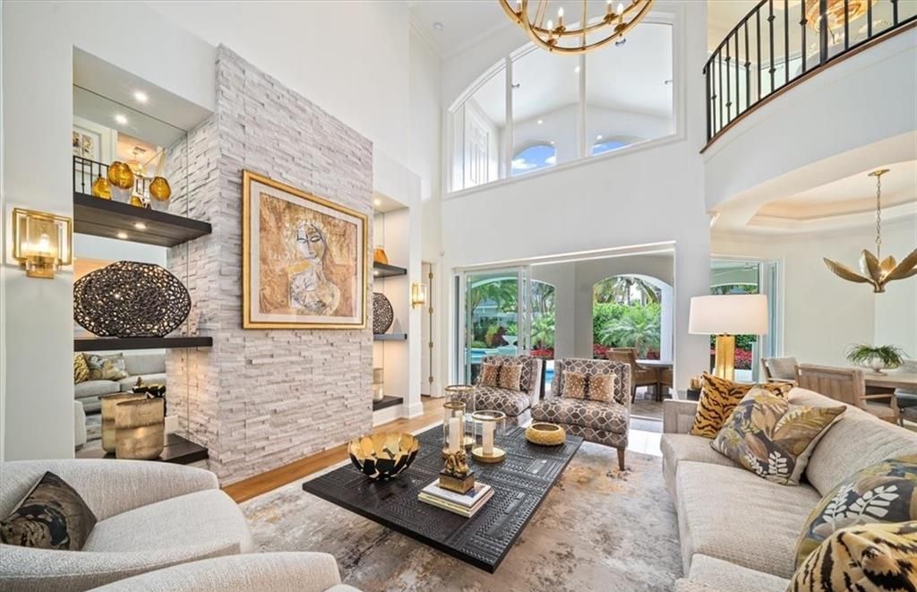 Discover unparalleled luxury living in this meticulously crafted 2-story residence, just moments from the Gulf of Mexico beaches in Naples.