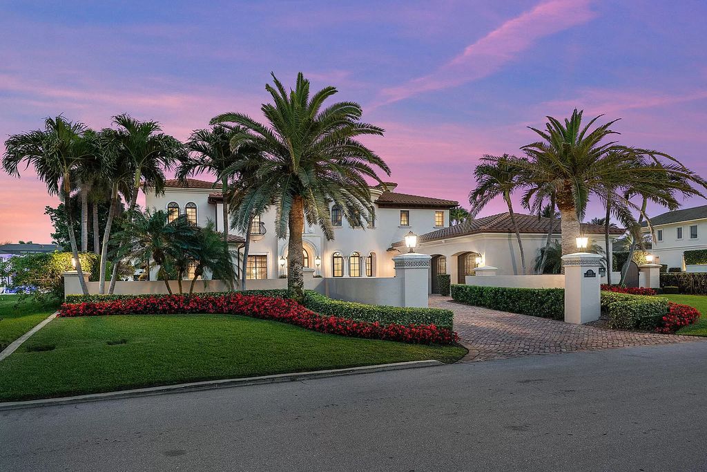 Discover unparalleled luxury at 336 E Coconut Palm Road in the prestigious Royal Palm Yacht & Country Club.