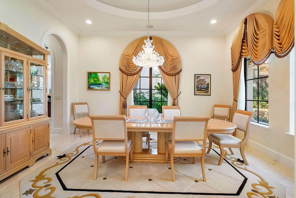 Experience unparalleled luxury at 1801 Royal Palm Way, a stunning double-lot estate in the prestigious Royal Palm Yacht & Country Club.