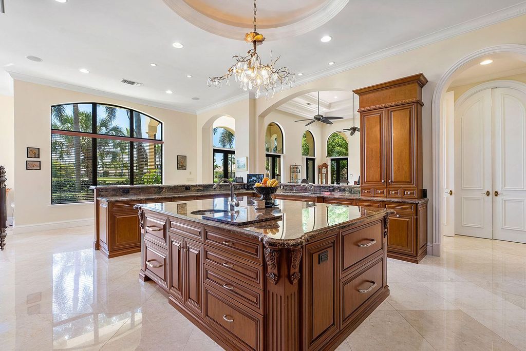 Experience unparalleled luxury at 1801 Royal Palm Way, a stunning double-lot estate in the prestigious Royal Palm Yacht & Country Club.