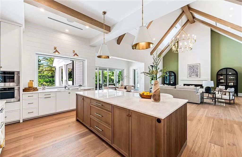 Experience luxury in this modern farmhouse at 712 Killdeer Pl, Naples, Florida. Built by the award-winning Van Emmerik Custom Homes, this 6,500 square feet home features high ceilings, beautiful millwork, and premium finishes.