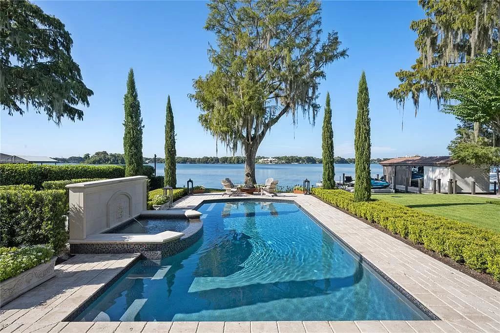Introducing a rare opportunity to own a unique lakeside property on Lake Maitland, part of the prestigious Chain of Lakes.