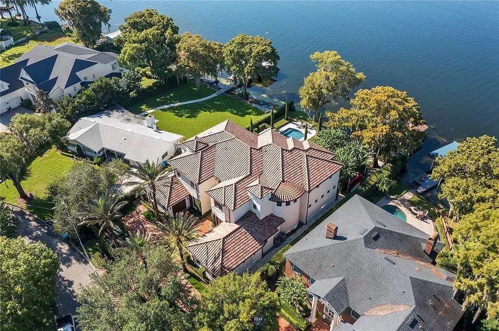 Introducing a rare opportunity to own a unique lakeside property on Lake Maitland, part of the prestigious Chain of Lakes.
