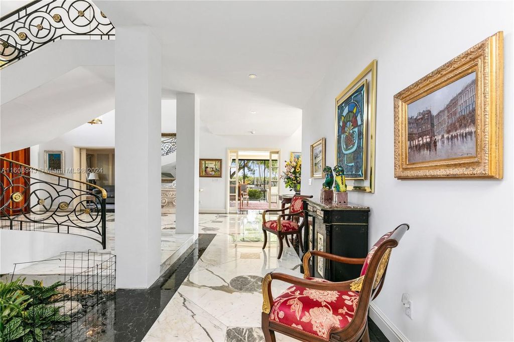 A spectacular 8-bed, 9-bath contemporary home at 241 Cape Florida Dr, Key Biscayne, Florida 33149.