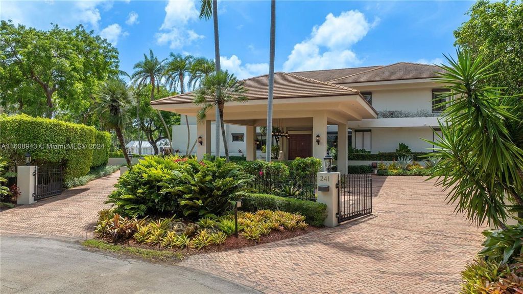 A spectacular 8-bed, 9-bath contemporary home at 241 Cape Florida Dr, Key Biscayne, Florida 33149.