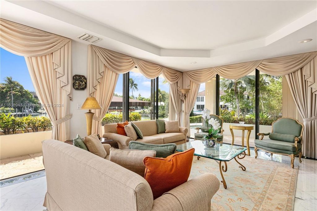 A spectacular 8-bed, 9-bath contemporary home at 241 Cape Florida Dr, Key Biscayne, Florida 33149.