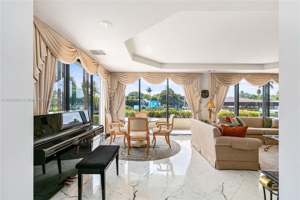 A spectacular 8-bed, 9-bath contemporary home at 241 Cape Florida Dr, Key Biscayne, Florida 33149.