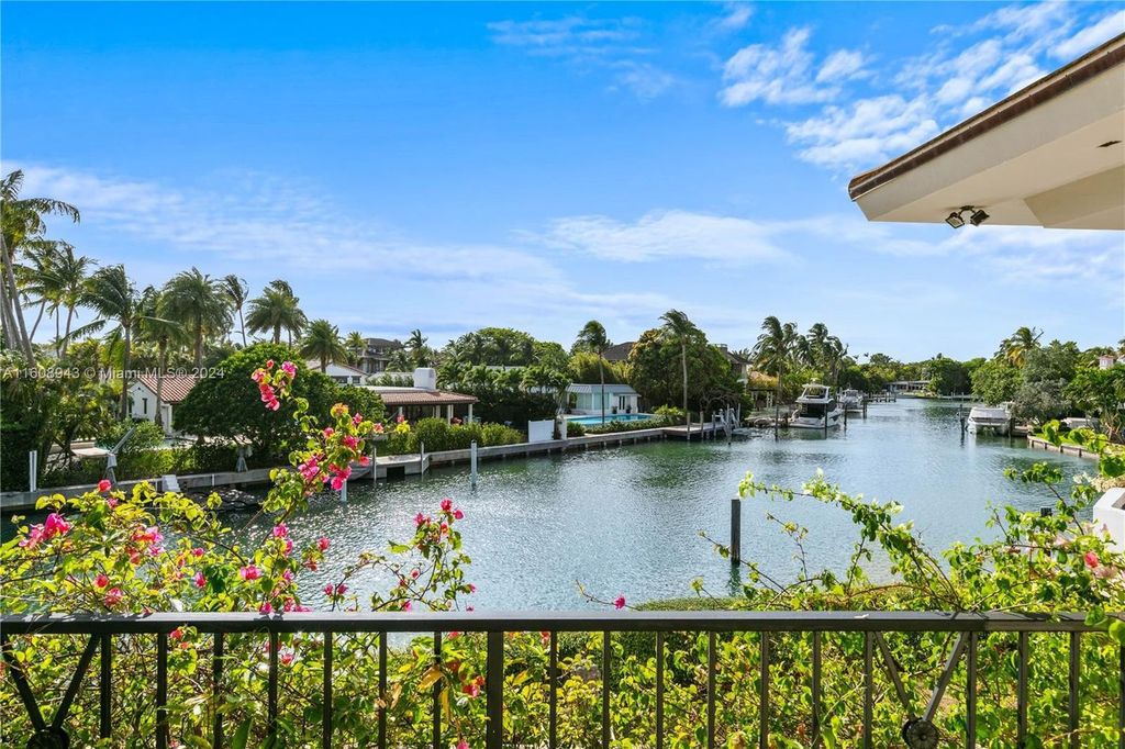 A spectacular 8-bed, 9-bath contemporary home at 241 Cape Florida Dr, Key Biscayne, Florida 33149.