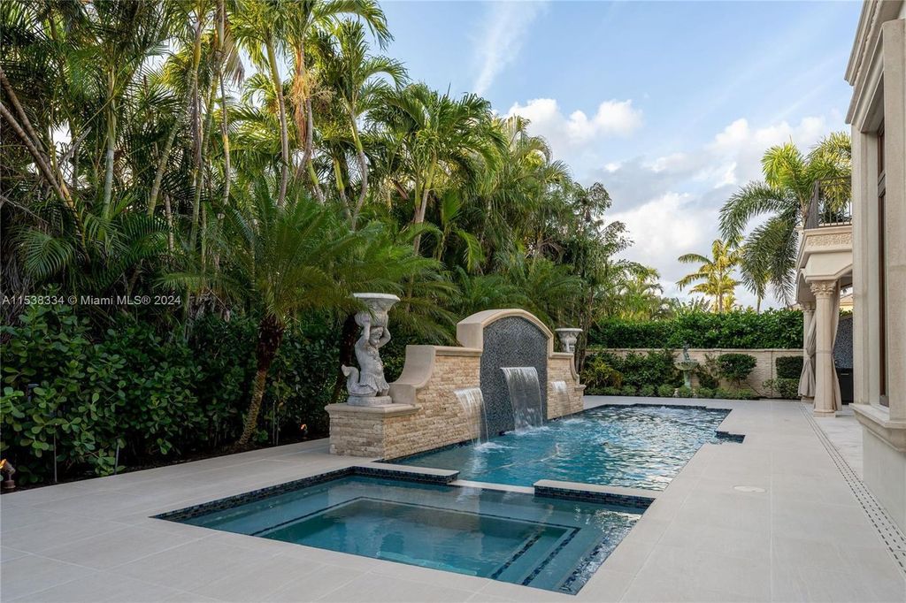 Step into a realm of timeless opulence at this neo-classical marvel in Boca Raton's esteemed Royal Palm Yacht and Country Club.