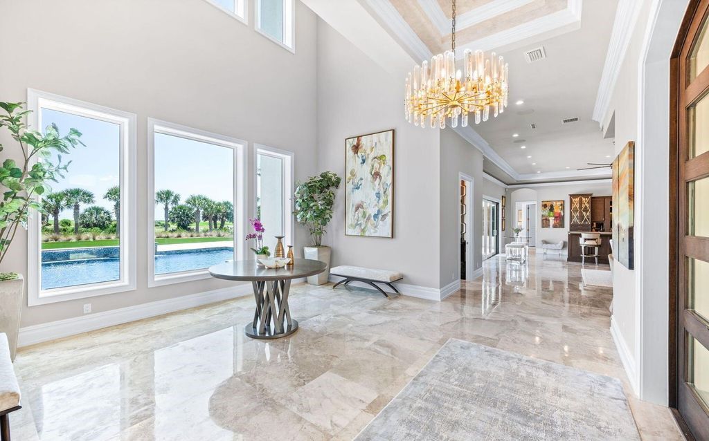 Welcome to the Northshore Retreat at 52 Northshore Drive, Palm Coast, Florida, 9,676 square feet estate on 2.6 acres in an exclusive gated community.