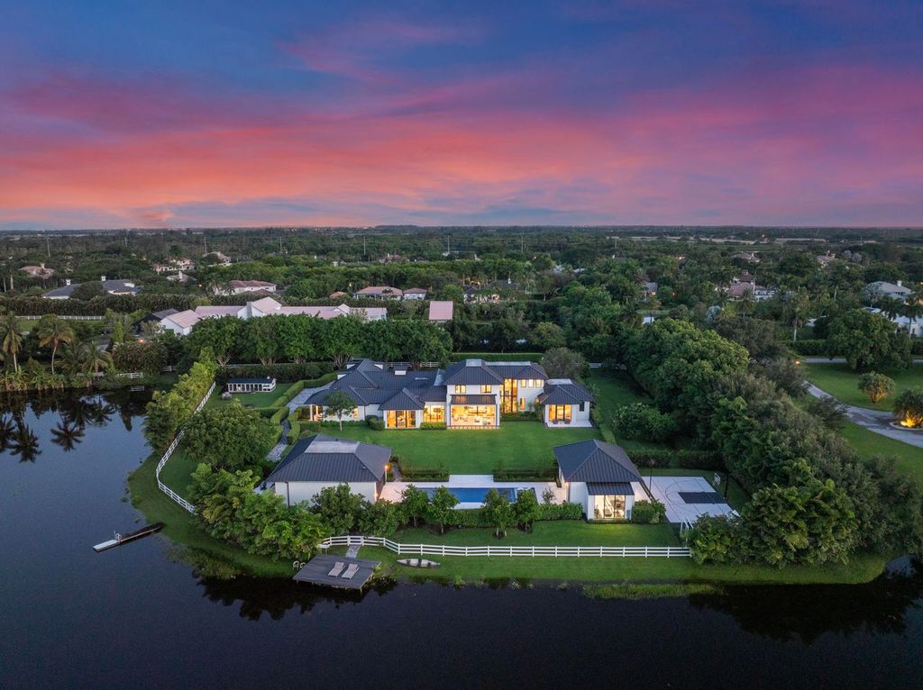 Discover this stunning 6-bedroom, 9-bathroom luxury estate spanning 10,099 square feet on a 2.88-acre lot in prestigious Delray Beach.