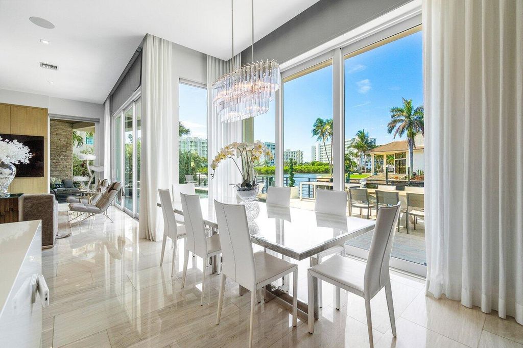 Welcome to 896 Mulberry Drive, a stunning 5 BD, 7 BA estate in the prestigious Walkers Cay/Boca Bay Colony, Boca Raton.