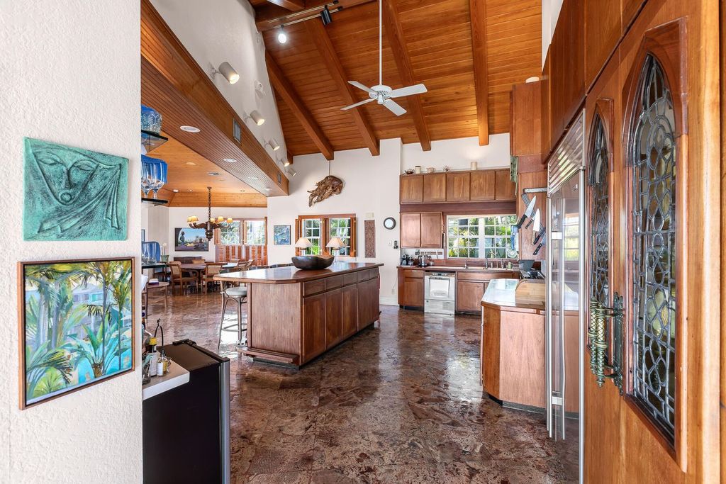 Discover luxury in the Florida Keys with this historic 5-bedroom, 5.5-bathroom home, situated at 400 South St, Key West, FL 33040. Adjacent to the iconic Southernmost Point buoy, this 4,008 square feet residence blends historic charm with modern amenities.