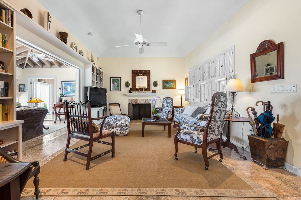 Discover luxury in the Florida Keys with this historic 5-bedroom, 5.5-bathroom home, situated at 400 South St, Key West, FL 33040. Adjacent to the iconic Southernmost Point buoy, this 4,008 square feet residence blends historic charm with modern amenities.
