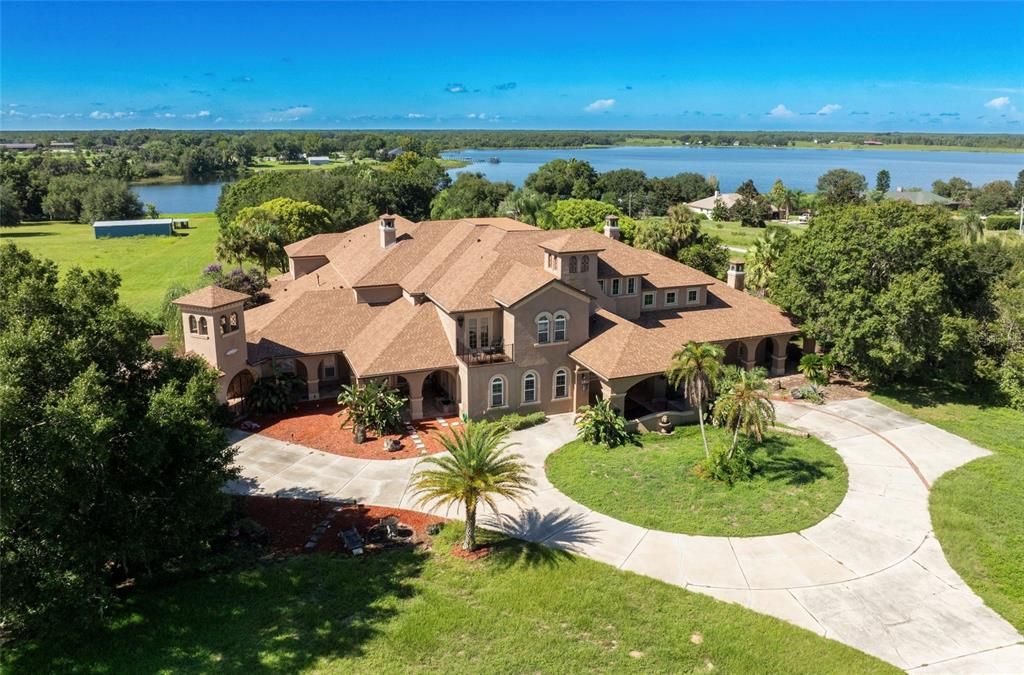 Nestled on 16 acres of meticulously landscaped grounds, this grand mansion boasts nearly 20,000 square feet of exquisitely designed living space.