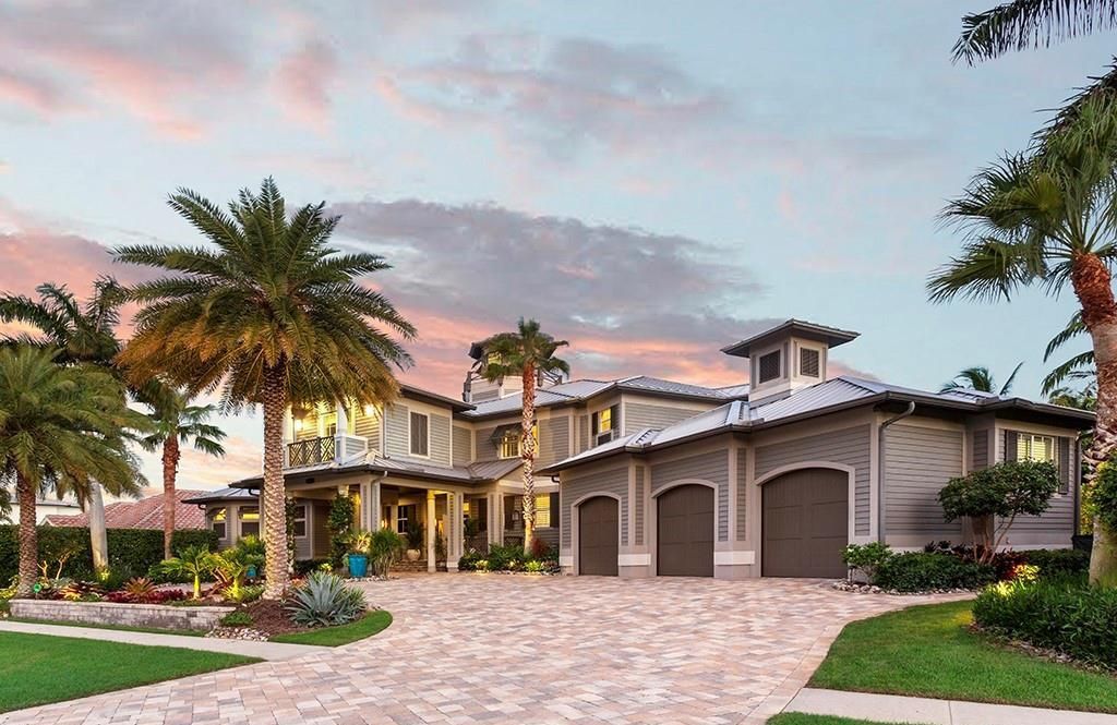 This stunning 7,105 square foot South Florida home, built in 2014 and never before on the market, epitomizes luxury living. Located at 1611 Collingswood Ct, Marco Island, FL 34145, it features 4 bedrooms, 7 bathrooms, a 3-story foyer, office, wine room, and an open concept kitchen.