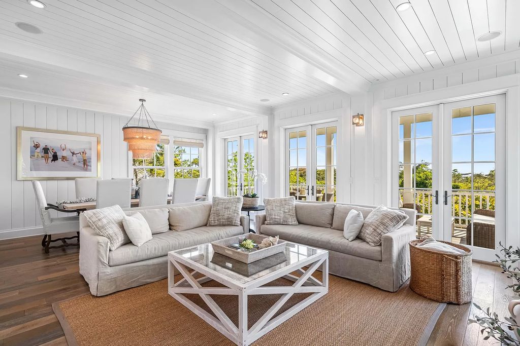 Welcome to an architectural masterpiece by Peter Block, where luxury meets seaside sophistication in this Nantucket-inspired residence.